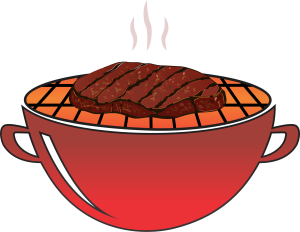 Et stykke biff på en liten grill.